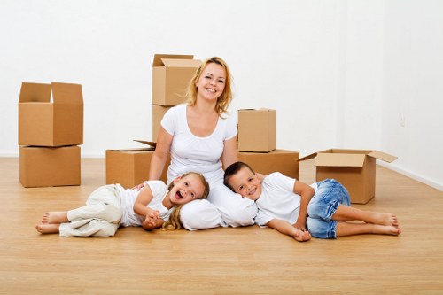 Experienced packers handling fragile items during a Cannhall move