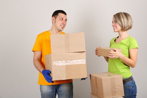 Removals team helping with furniture during a Cannhall house move